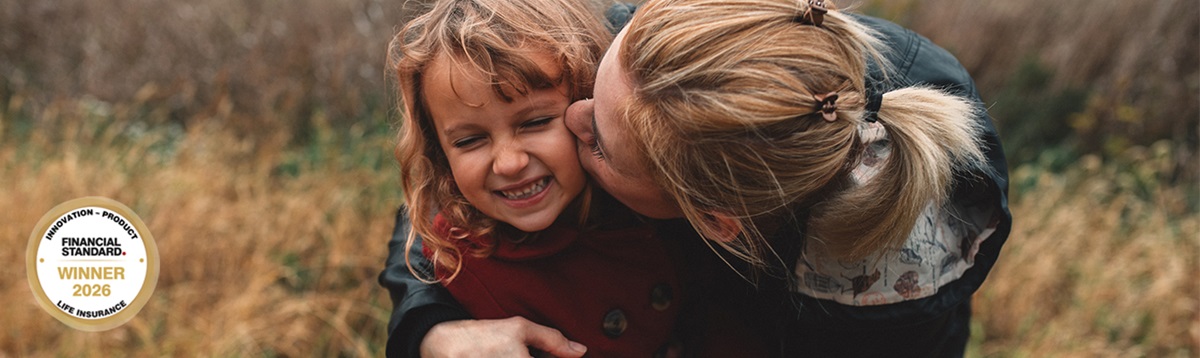 Mum kissing child